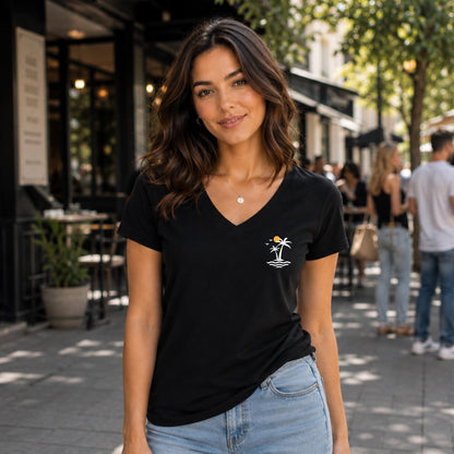 May include: A black short-sleeved t-shirt with a V-neckline. The shirt features a small graphic on the left chest area depicting two white palm trees, a yellow sun, and stylized white waves representing the ocean surface.