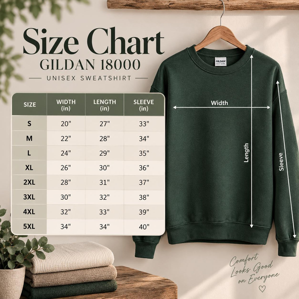 May include: A dark green Gildan 18000 unisex sweatshirt hanging on a wooden hanger. A size chart displays width, length, and sleeve measurements in inches for sizes S through 5XL. White arrows indicate the measurement points on the sweatshirt.