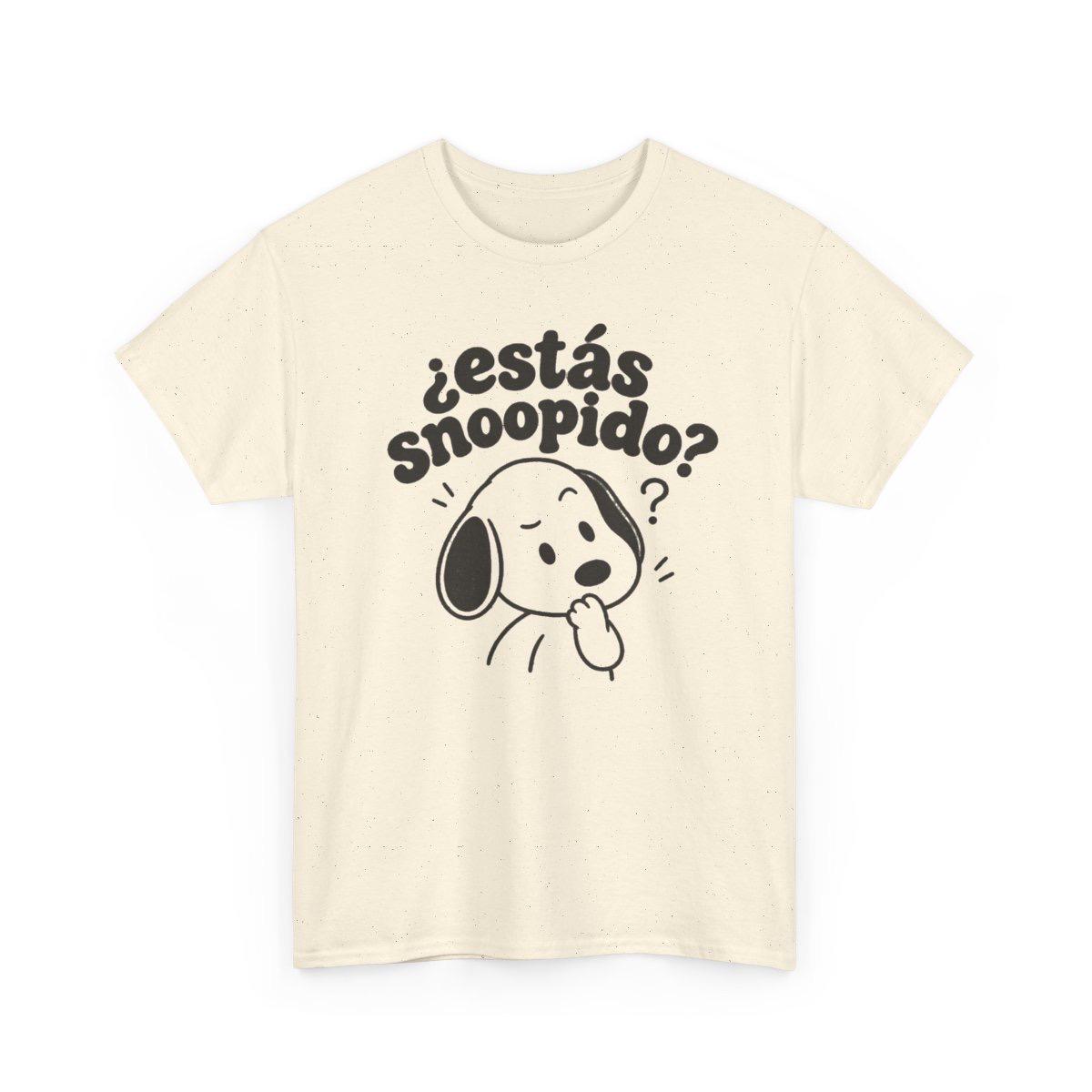 May include: A cream-colored short-sleeve t-shirt featuring a dark brown graphic of a cartoon dog with a questioning expression. Above the dog, the text reads "¿estás snoopido?" in a bold, rounded font. The fabric has a subtle speckled texture.