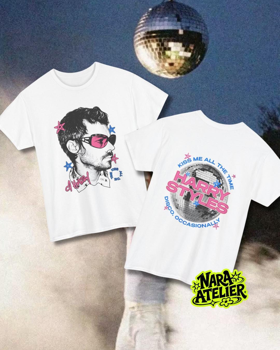May include: Two white t-shirts featuring graphic prints. The front design shows a profile illustration of a person wearing pink-tinted sunglasses with blue and pink stars. The back design features a disco ball with the text Harry Styles.