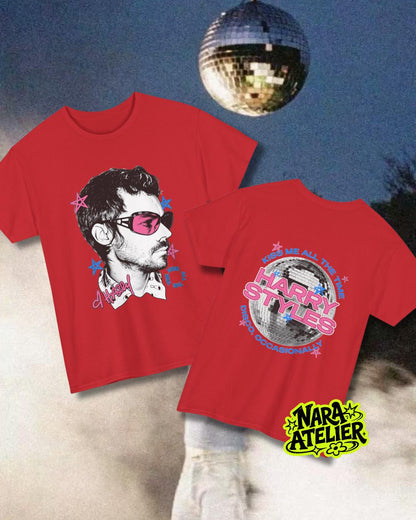 May include: Two red t-shirts featuring graphic prints. One shirt displays a profile illustration of a person wearing pink sunglasses with the text A HARRY. The other shirt shows a disco ball graphic with the text HARRY STYLES KISS ME ALL THE TIME.