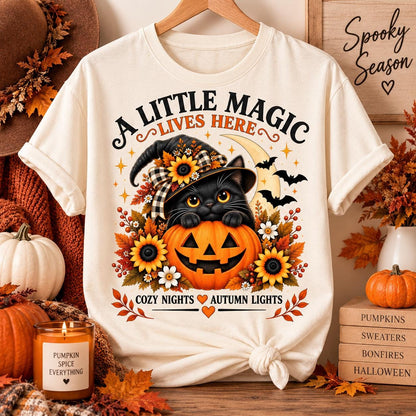 Black Cat Halloween Shirt, Witch Cat Pumpkin T-Shirt, A Little Magic Lives Here Tee, Cozy Spooky Season Top, Fall Cat Lover Gift image 1