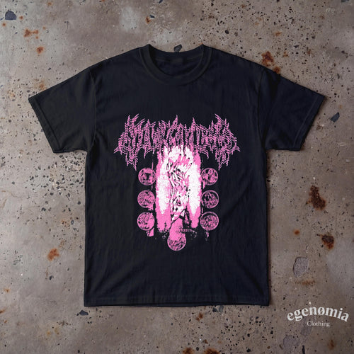 May include: A black short-sleeve t-shirt featuring a pink graphic print. The design includes stylized text at the top, a central image of hands reaching upward, and a circular arrangement of smaller detailed illustrations surrounding the center.