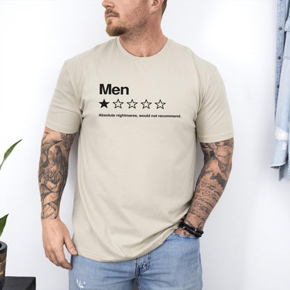 May include: A beige short-sleeved t-shirt featuring the black text 'Men' above a single filled-in star and four empty stars, followed by the text 'Absolute nightmares, would not recommend.' printed in a simple black sans-serif font.