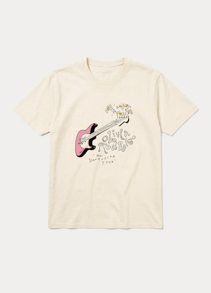 May include: A cream-colored short-sleeve t-shirt featuring a graphic of a pink electric guitar with white daisies sprouting from the headstock. The text reads Olivia Rodrigo and The Unraveled Tour in a stylized, hand-drawn black font.