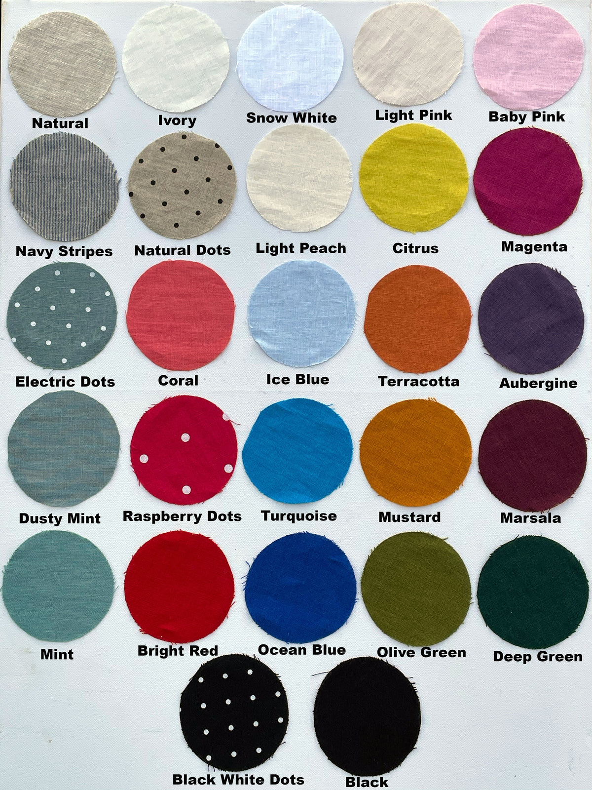 May include: A color chart of 20 fabric swatches, each with a different color and pattern. The swatches are arranged in four rows of five. The colors include natural, ivory, snow white, light pink, baby pink, navy stripes, natural dots, light peach, citrus, magenta, electric dots, coral, ice blue, terracotta, aubergine, dusty mint, raspberry dots, turquoise, mustard, marsala, mint, bright red, ocean blue, olive green, deep green, black white dots, and black.