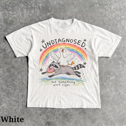 Undiagnosed But Something Ain't Right Shirt, Funny Goose Riding Raccoon Tee, Comfort Colors Silly Goose T-Shirt, Mental Health Humor Gift