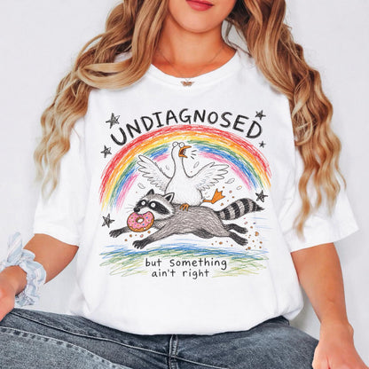 Undiagnosed But Something Ain't Right Shirt, Funny Goose Riding Raccoon Tee, Comfort Colors Silly Goose T-Shirt, Mental Health Humor Gift